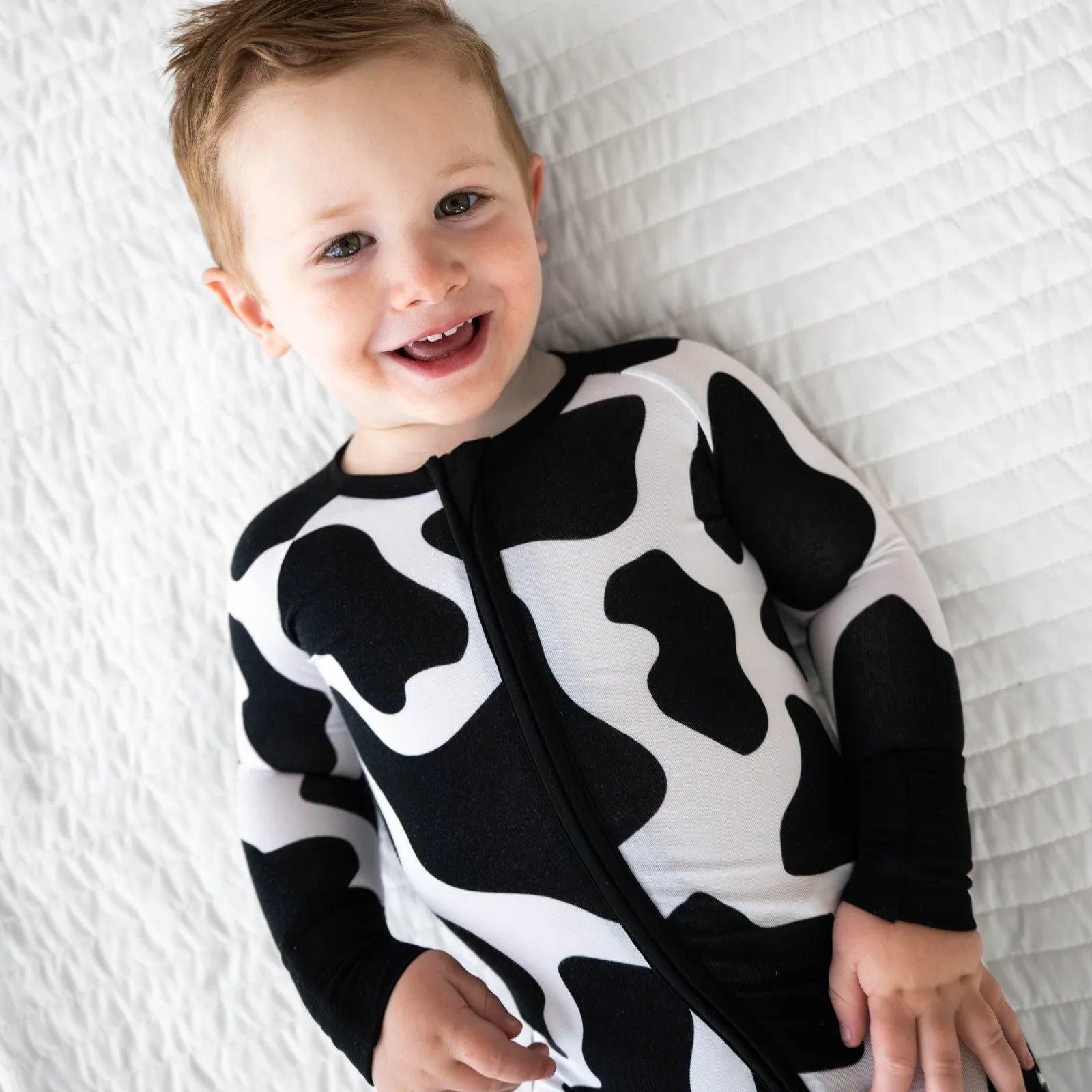 Sure! An optimized title for the e-commerce product Moo Crew Zippy could be:

Cozy Moo Crew Zippy Hoodie - Comfortable, Stylish, and Perfect for All Seasons

Feel free to adjust any descriptors to better fit the specific attributes of the product!
