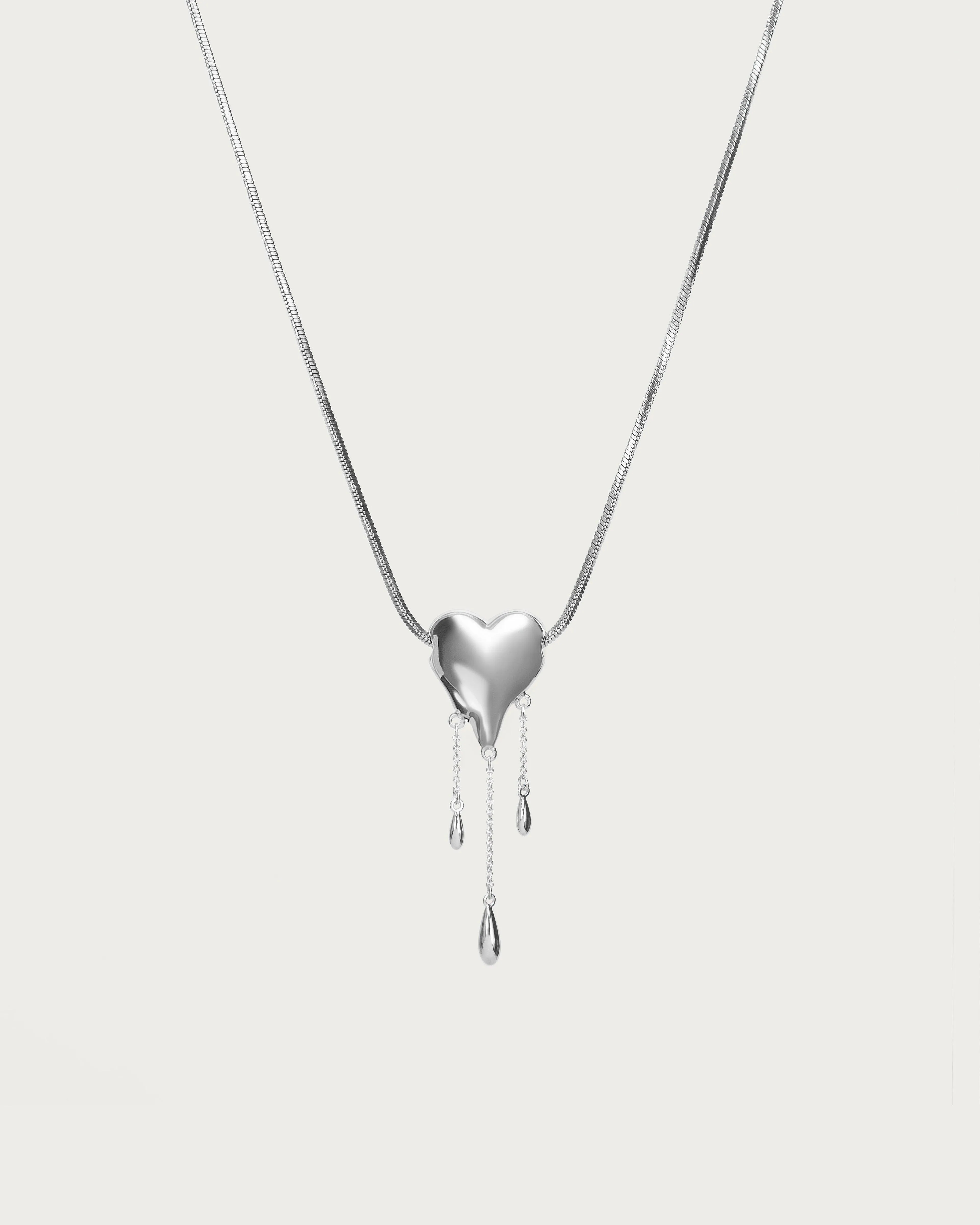 Venom’s Golden Drip Heart Necklace