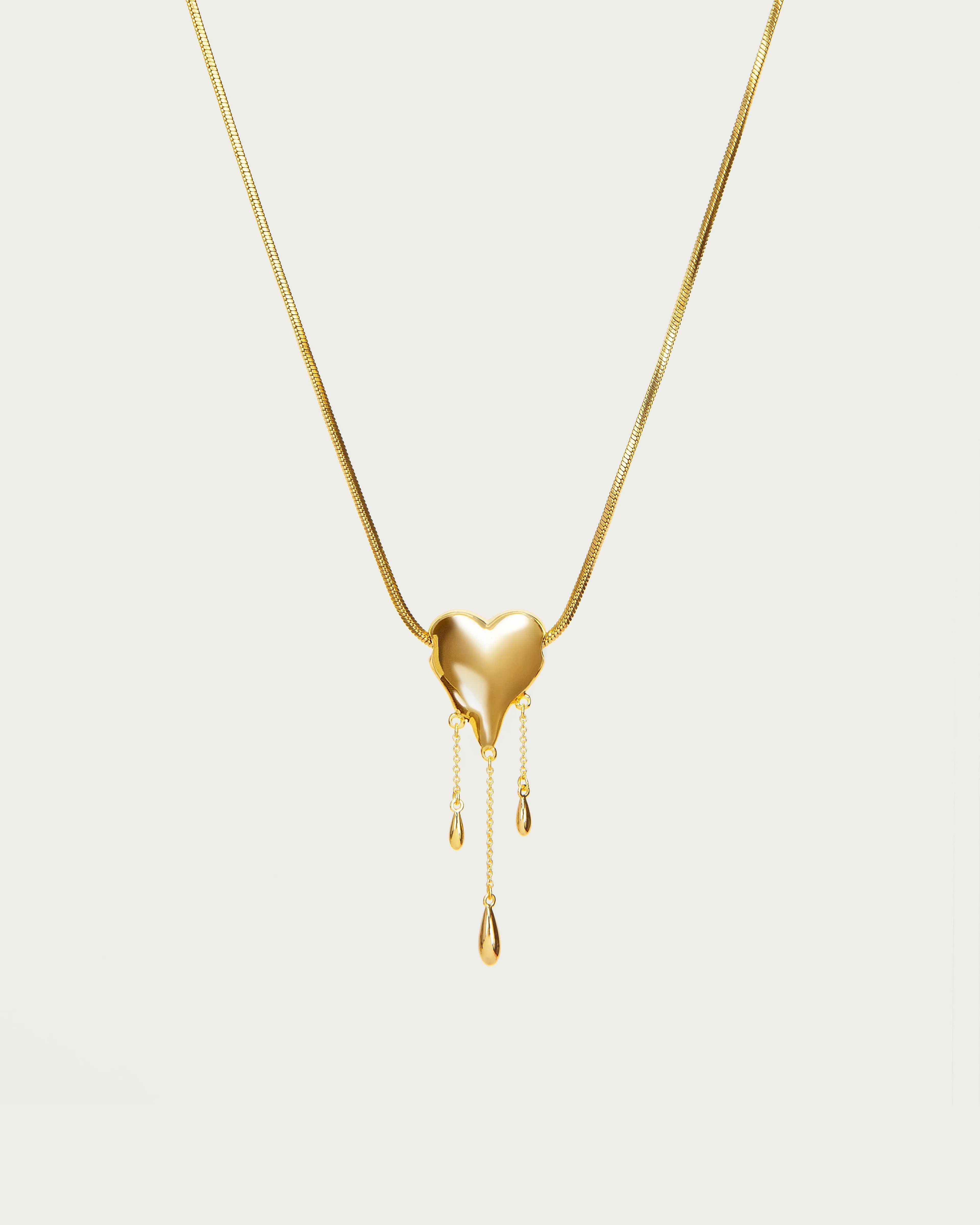 Venom’s Golden Drip Heart Necklace