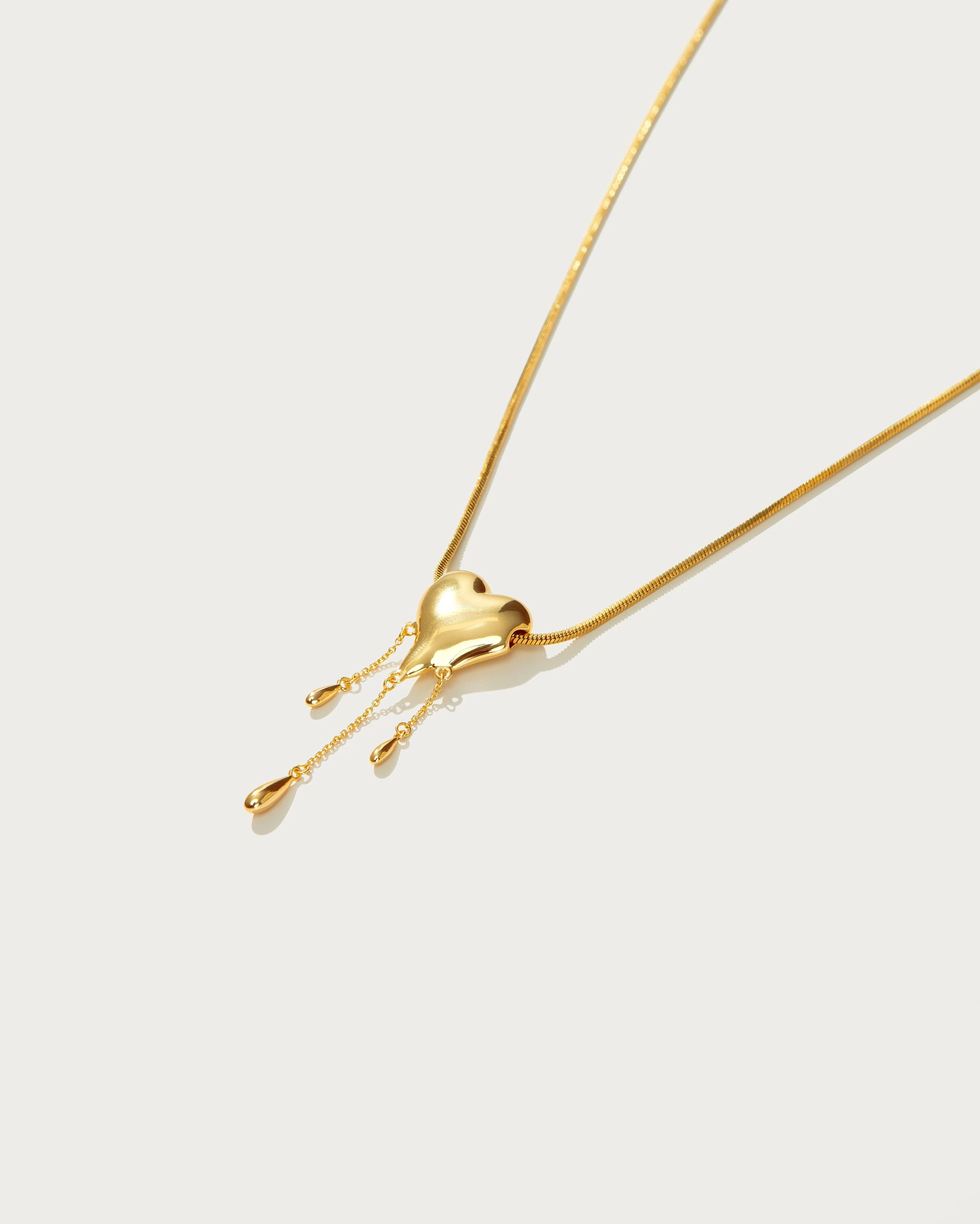 Venom’s Golden Drip Heart Necklace